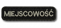 Emblemat z nazwą miejscowości